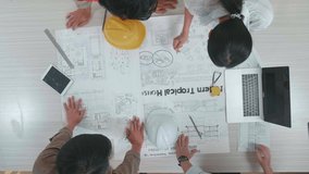 Top View Of Group Asian Engineers Discuss About Work At The Office
 - Powered by Shutterstock - Get 15% off with code: PIKWIZARD15
