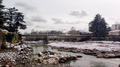 Kutaisi, Georgia - March 18, 2022: White bridge in Kutaisi in winter.