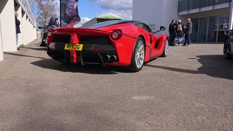 Goodwood, West Sussex, UK, April 02, 2022. A red Ferrari La Ferrari super car at Goodwood near Chichester on a fine sunny day day.