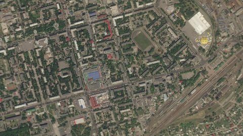 Earth zoom in from space and focus on Kremenchuk, Poltava region, Ukraine. The animation continues by zoom out through clouds and atmosphere into space. Background for travel intro.