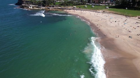 Sydney, Australia - 03-14-2022: Drone Shot of People at the Beach on a Sunny Summers Day 