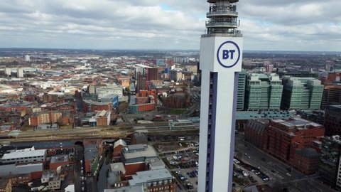 BIRMINGHAM, UK - 2022: Birmingham UK city centre aerial view reveal around the BT tower skyscraper