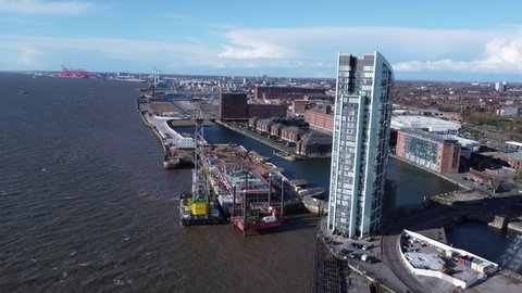 LIVERPOOL, UK - 2022: Aerial view of Liverpool docks with skyscraper city building