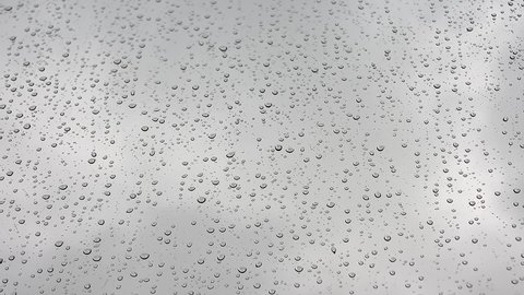 8K 7680X4320.Water drops of rain on wet window glass surface.Transparent blobs of rains on glass.Drop randomly sliding on windows. Will mix decently if blend mode set luminosity.Aqua romantic drip awe