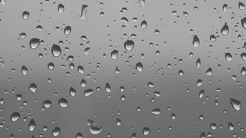 8K 7680X4320.Water drops of rain on wet window glass surface.Transparent blobs of rains on glass.Drop randomly sliding on windows. Will mix decently if blend mode set luminosity.Aqua romantic drip awe