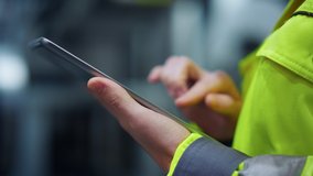 Woman hands taping tablet computer on manufacturing modern facility factory. Closeup unrecognizable industrial engineer holding modern tablet computer. Close up technology professional working. - Powered by Shutterstock - Get 15% off with code: PIKWIZARD15