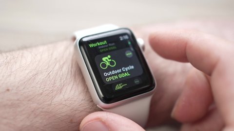 Selecting a sports activity on an Apple smart watch to track fitness activities. MONTREAL CANADA APRIL 2022