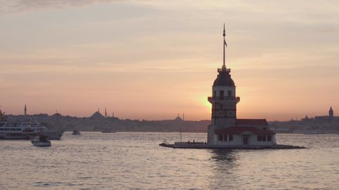 Awesome sunset view of the Maiden's Tower (Leander's Tower) and the Bosporus in Istanbul, Turkey. Istanbul is a popular tourist destination in the world.
