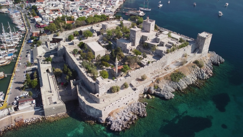 Awesome aerial view of Bodrum Castle in Turkey. Drone flying over the castle. Bodrum is a popular tourist destination in the Turkish Riviera. Royalty-Free Stock Footage #1089374181