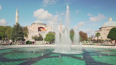 Scenic fountain at the Sultanahmet Square and the Hagia Sophia in Istanbul, Turkey. The Sultanahmet Square is a popular tourist attraction of the world.