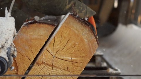 The work of the band sawmill. Cutting wood at the sawmill. Woodworking production.