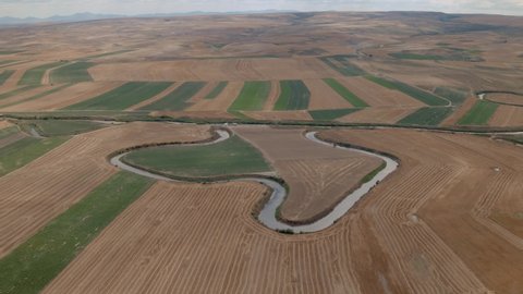 A meander also used as irrigation channel in Polatlı, Ankara agricultural fields. This channel supplies irrigation water for wheat, maize and sugar beets crops within the same region.  