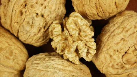 Whole walnuts kernel on nuts in shell rotating slowly