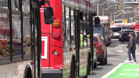 Toronto,Ontario, Canada April 2022 Car and bus traffic jam and gridlock on downtown city streets in Toronto