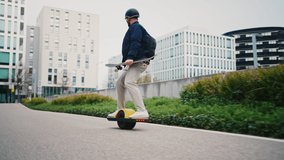 Close up leg shot of a skater with electric skateboard. Copy space - Powered by Shutterstock - Get 15% off with code: PIKWIZARD15