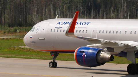 MOSCOW, RUSSIAN FEDERATION - JULY 31, 2021: Airbus A320 Aeroflot taxiing after landing at Sheremetyevo airport on a summer day. Tourism and travel concept