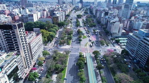 Famous 9th July avenue at downtown Buenos Aires, Argentina. Aerial landscape of tourism landmark downtown capital city Argentina. Tourism landmark. Outdoor downtown city Buenos Aires european style.