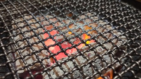Heat coal and fire flaming on a stove for Yakiniku in Japanese restaurant.
