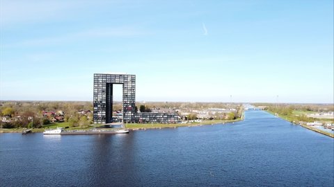 GRONINGEN, NETHERLANDS - 16. APRIL 2022:  Ascending Aerial view of Tasman Tower, modern apartment complex in Groningen.