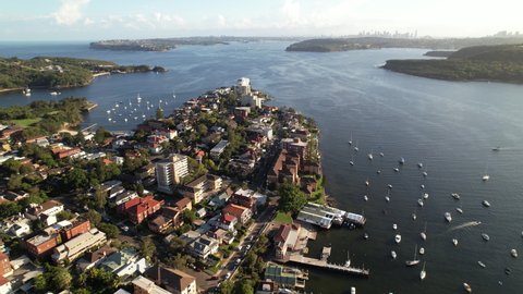 Sydney, Australia - 02-16-2022: Manly Drone Shot over Busy Boats at Sunset