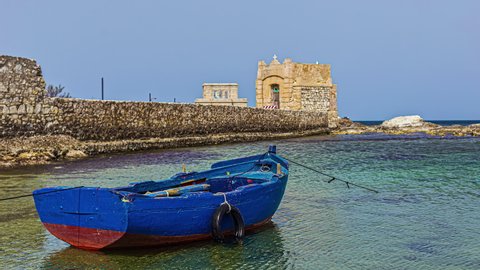  Static view of historical Ligny Tower, old watchtower in Trapani, capital city of Trapani region on Sicily Island, Italy at daytime in timelapse.