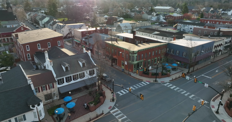 Historic American town square buildings in golden hour light. Aerial of Elizabethtown, Pennsylvania, Lancaster County USA.