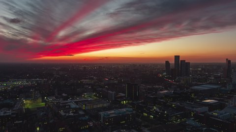 Establishing Aerial View Shot of Manchester UK, City Skyline England United Kingdom mega sunset, superb colors