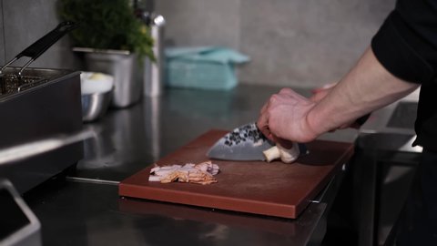 footage of slicing smoked pork, Diet Healthy Lifestyle. Close-Up Man Cutting Champignons on Wooden Cut Board. Diet Healthy Eating. Macro Shot Male Hands Cutting Champignon Mushroom By Knife on Wooden 