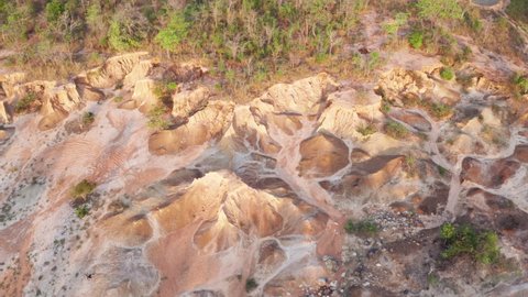 Aerial view of Natural disasters in tourist attractions, soil and rock layers, and the nature of mountains are eroded by rain. Footage b roll 4k aerial view.