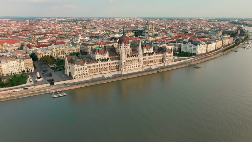 Aerial view of Budapest Parliament Building. Hungary Capital Cityscape at daytime. Travel, tourism and European Political Landmark Destination. 4K establishing panorama Royalty-Free Stock Footage #1089438661