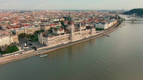 Aerial view of Budapest Parliament Building. Hungary Capital Cityscape at daytime. Travel, tourism and European Political Landmark Destination. 4K establishing panorama