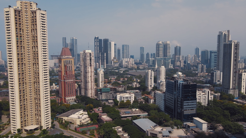 Aerial view of the Financial District in Mumbai. Skyline of Mumbai City, India. Drone shot of the skyscraper buildings and high-rose residential towers. Urban jungle. Developing India concept. 4K Royalty-Free Stock Footage #1089441695