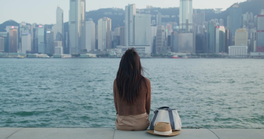 Woman look at the Hong Kong city