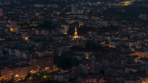 Establishing Aerial View Shot of Lyon Fr, Auvergne-Rhone-Alpes, France at night evening, busy center