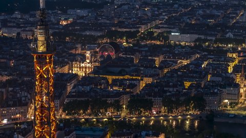 Establishing Aerial View Shot of Lyon Fr, Auvergne-Rhone-Alpes, France at night evening, cinematic view of city