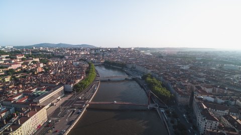 Establishing Aerial View Shot of Lyon Fr, Auvergne-Rhone-Alpes, France, old part, bridges and river, early day