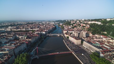 Establishing Aerial View Shot of Lyon Fr, Auvergne-Rhone-Alpes, France, old part, bridges and river, day time