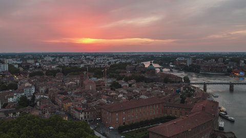 Establishing Aerial View Shot of Toulouse Fr, Haute-Garonne, France, red sky