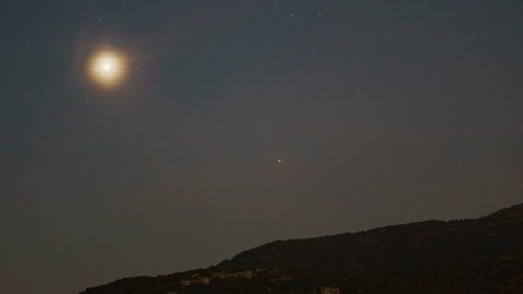Time lapse of planets mars and venus moving on the night sky til twilight of dawn from sunrise in mountains, Greece