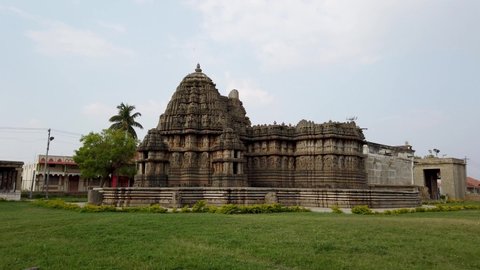 Hosaholalu, Karnataka, India-April 6 2022; An Old Shiva temple built in Hoysala style during the 13th century with beautiful stone carvings of deities on the exterior at Hosaholalu, Karnataka.
India.