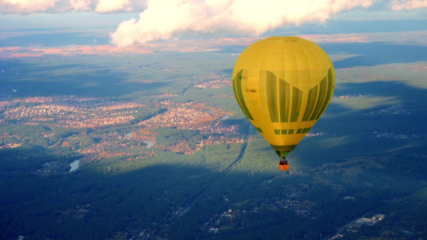 Yellow Hot Air Balloon Flying Over Vilnius City In Lithuania. - aerial Royalty-Free Stock Footage #1089461801