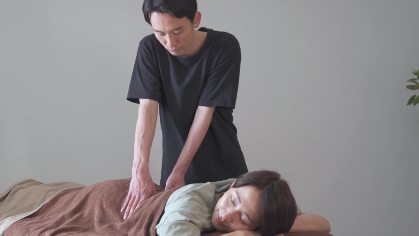 Japanese woman receiving a massage Royalty-Free Stock Footage #1089462207