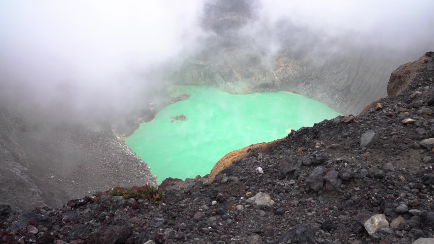 Active volcano crater green lake at Santa Ana in El Salvador Central America, Wide handheld shot