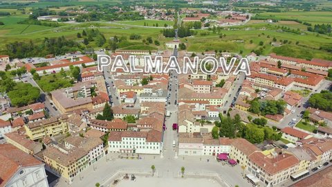 Inscription on video. Palmanova, Udine, Italy. An exemplary fortification project of its time was laid down in 1593. Neon white effect text, Aerial View