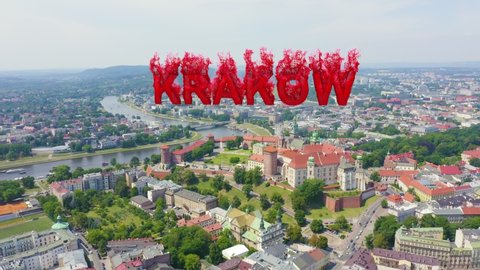 Inscription on video. Krakow, Poland. Wawel Castle. Ships on the Vistula River. View of the historic center. Flames with dark fire, Aerial View, Point of interest