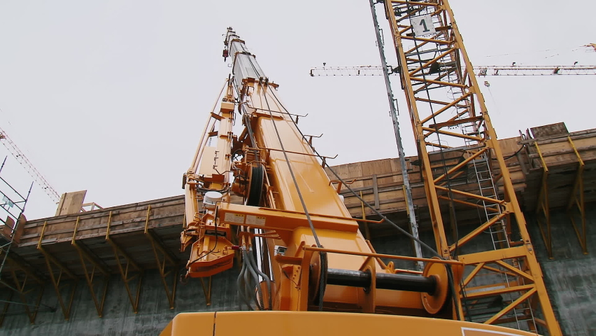 Rotation of the crane tower on the basis of the car. Royalty-Free Stock Footage #1089469569