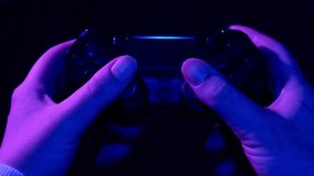 Girl gamer plays video games. Joystick use. First-peson view. 4K footage