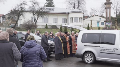 Ukraine, Lviv Oblast - April 2, 2022: Funeral of a soldier in a small village in Ukraine in the Lviv Oblast