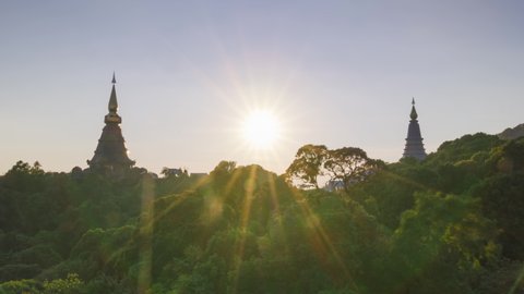 Time Lapse Video 4K of Twilight Moments sunset or sunrise Above the sacred pagoda at Doi Inthanon National Park, Chiang Mai, Thailand.