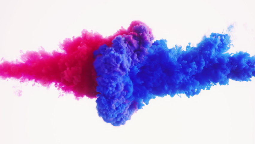 Blue and red ink mixed in water on white background